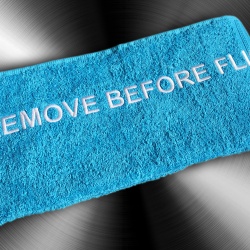 Полотенце махровое Remove Before Flight 50х90см
