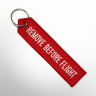 Брелок-стрела Remove Before Flight светится в темноте
