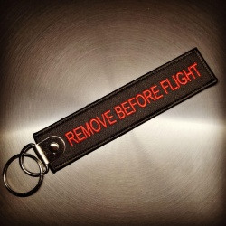 Брелок Remove Before Flight чёрный